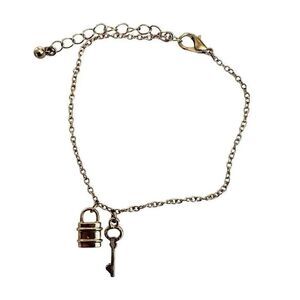 Gold tone lock and key charm chain bracelet